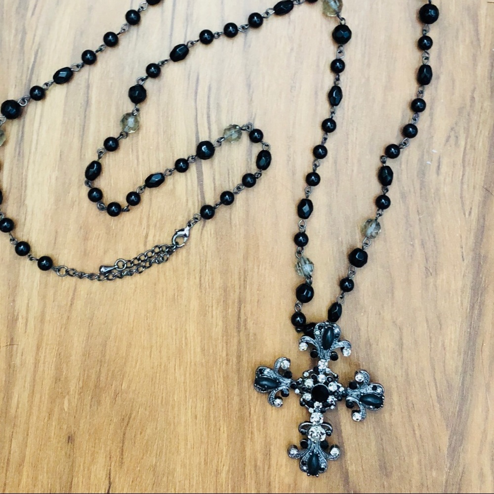 Black and glass cross long necklace.